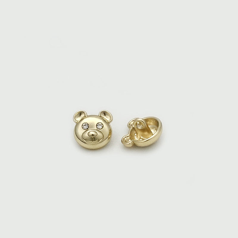Gold bear-head metal button pair with two clear rhinestone accents, 12mm