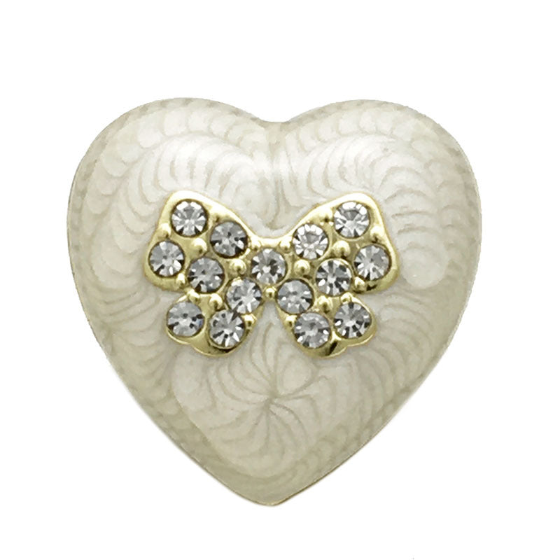 White heart-shaped beaded metal button with crystal bow detail, 15–22.5 mm