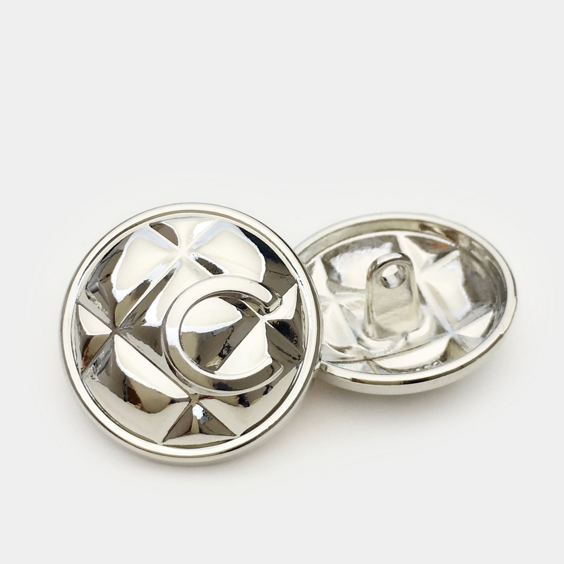Silver letter C metal button front and back with shank, embossed grid pattern
