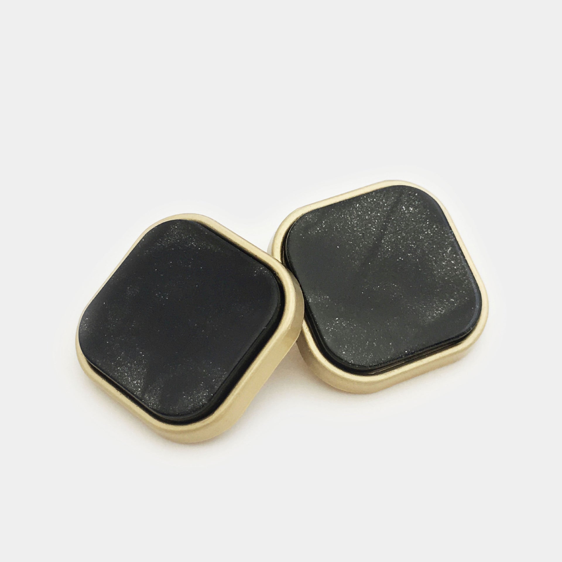 Square resin alloy buttons with handle, dark black front; gold-tone edges