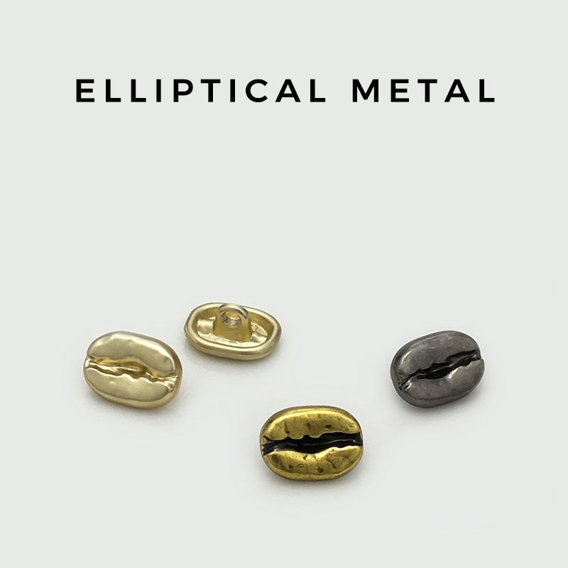 12mm oval concave metal shirt buttons, mixed gold and dark finishes, front view