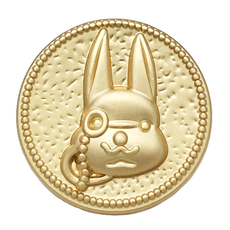 Rabbit cartoon metal button with shank, gold-tone front view