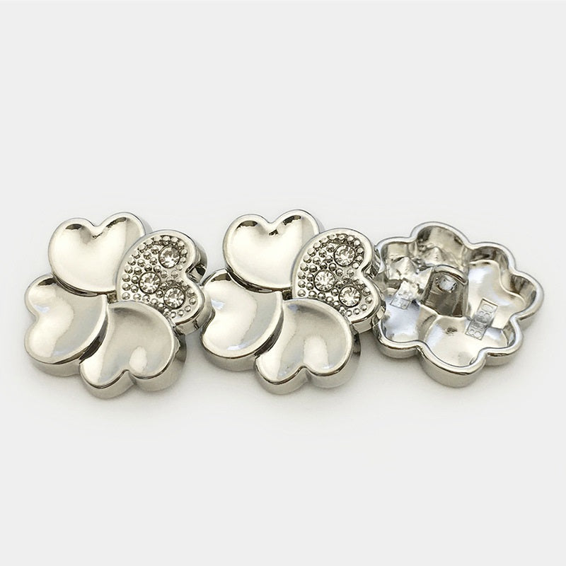 Silver four-leaf clover metal buttons with rhinestone-embellished center and shank backs