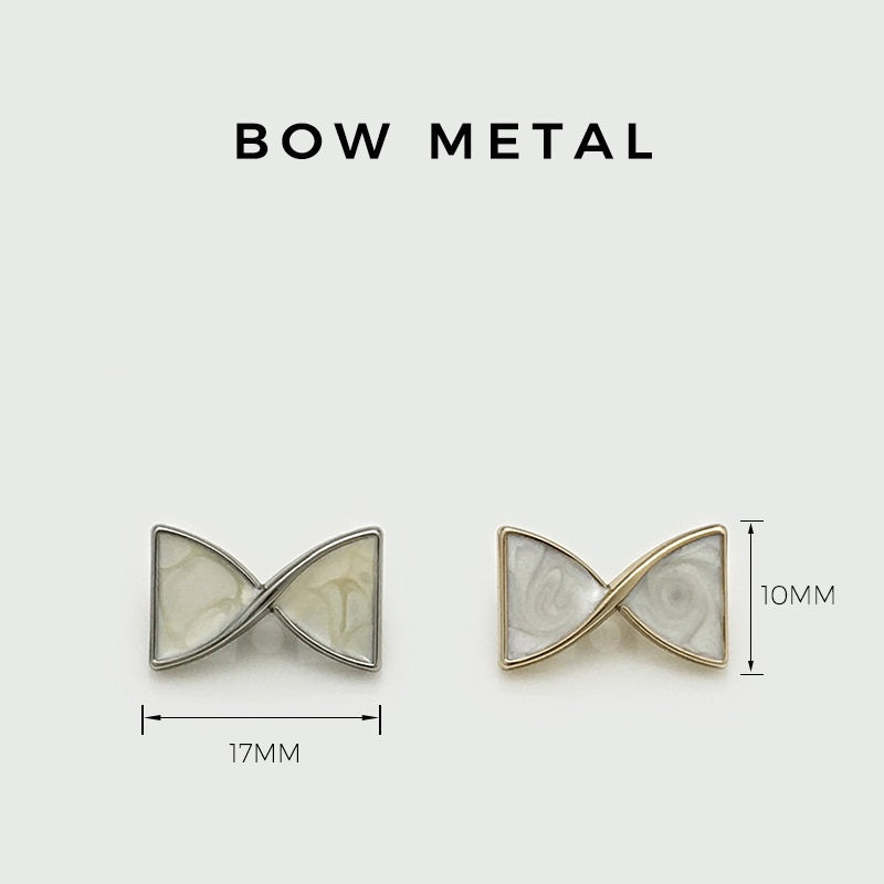 Bow-knot metal button size: 17mm wide, 10mm tall, silver tone
