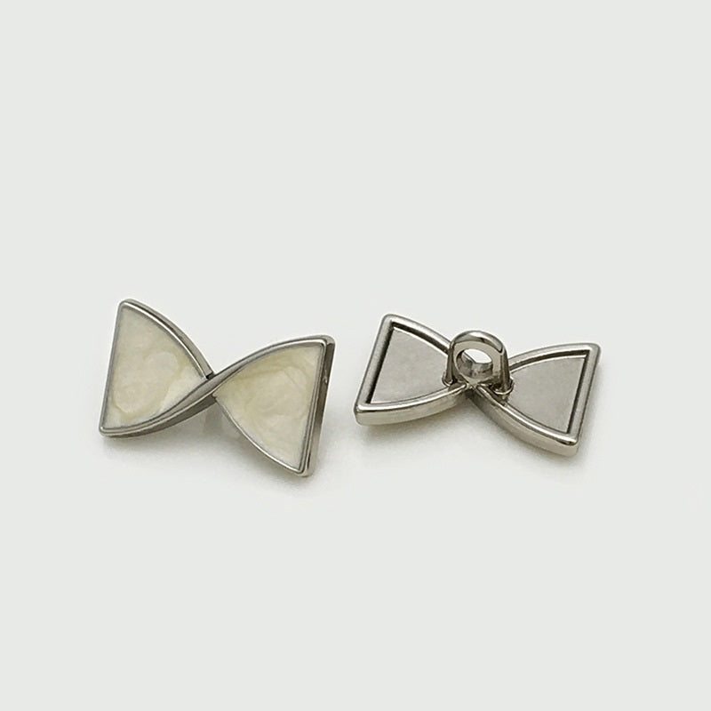 Bow-knot metal button with shank, silver tone, 17x10mm