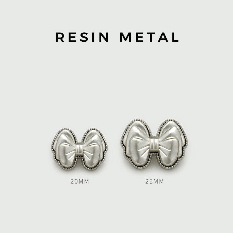 Resin metal bow buttons, 20mm and 25mm, white double-bow with trim