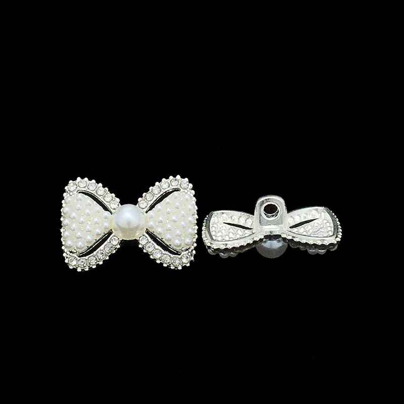 Pearl bow metal button front with faux pearl center and crystal border, loop shank