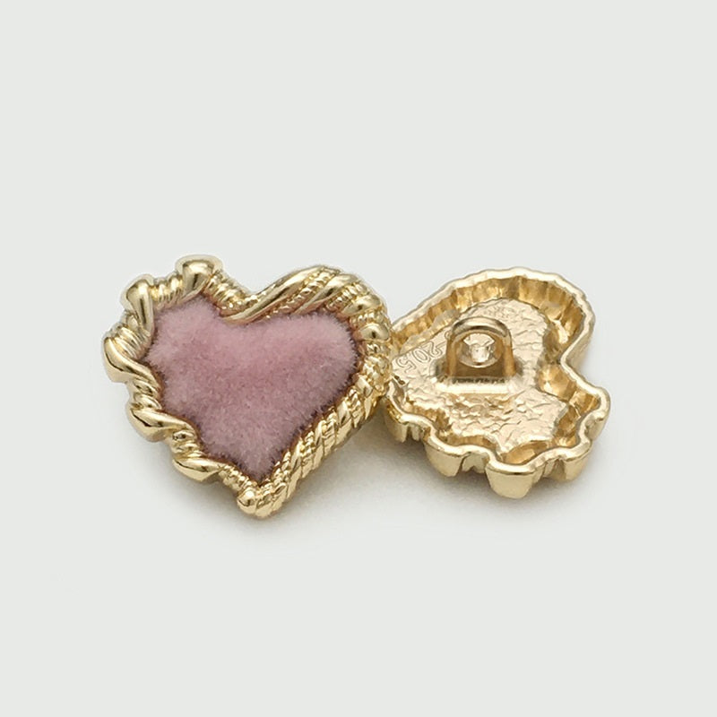 Heart button with pink velvet front and gold-tone shank backing