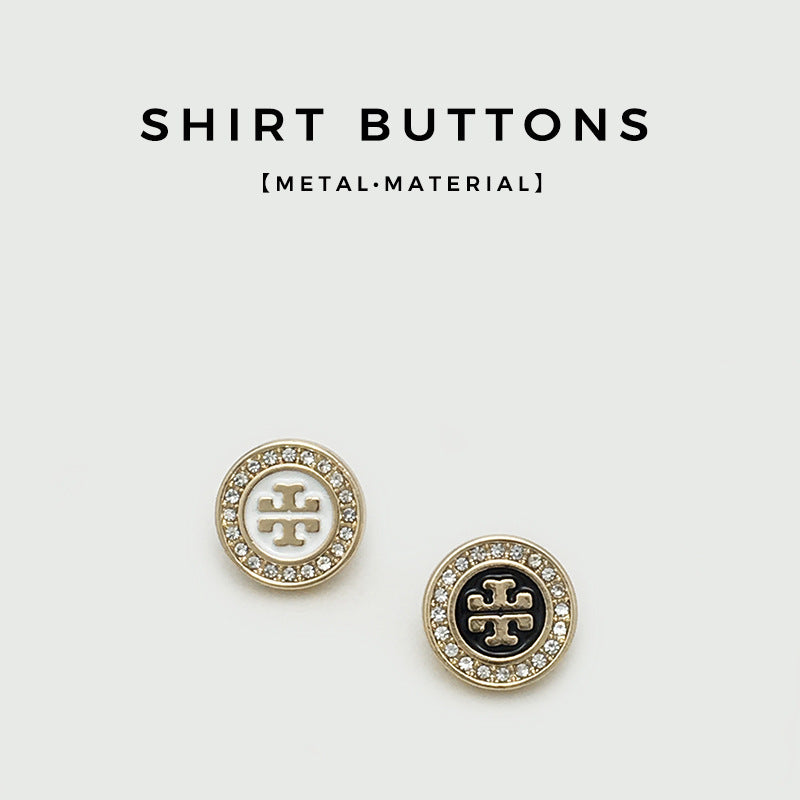 Gold shirt buttons: two round designs with white and black logo centers, crystal trim