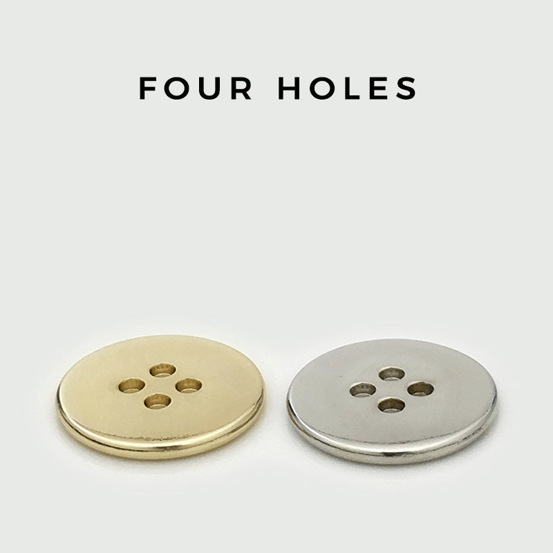 Round metal button backs with four holes, gold and silver finishes