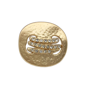 Gold decorative button with irregular metal edge and sparkling diamond rhinestone inlay