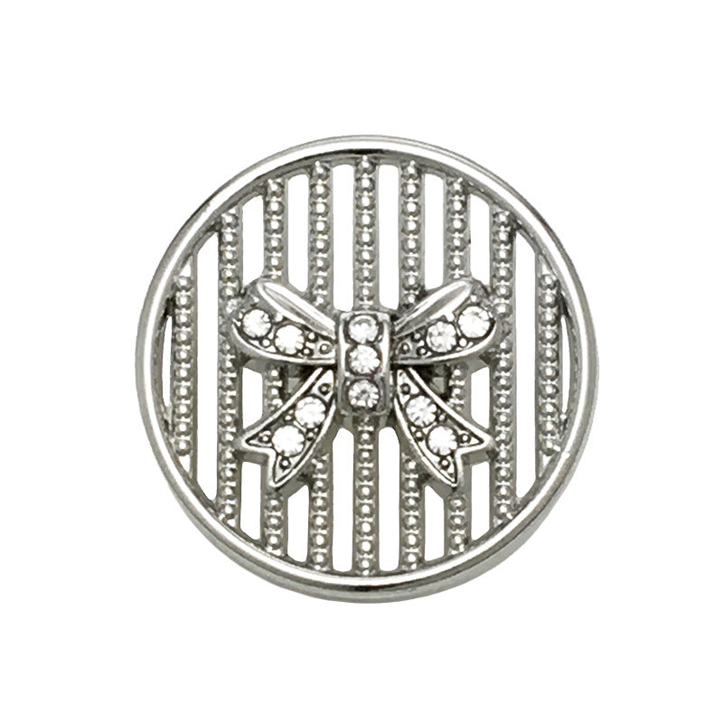 Silver diamond-pattern bowtie metal button, 25mm, hollowed design with rhinestone accents.