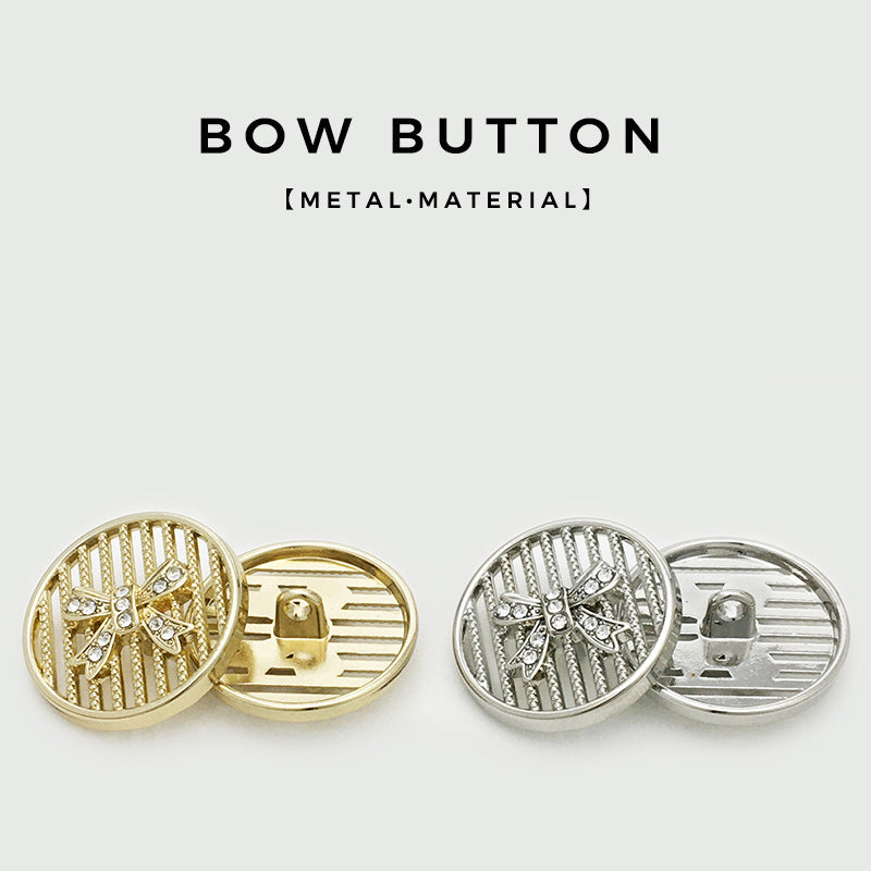 Gold and silver bowtie metal buttons, round fronts with gem detailing and ridged backs.