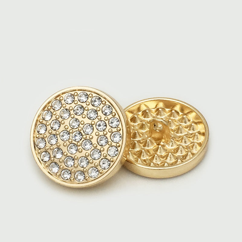 Gold coat button pair: rhinestone front and ridged back, round metal
