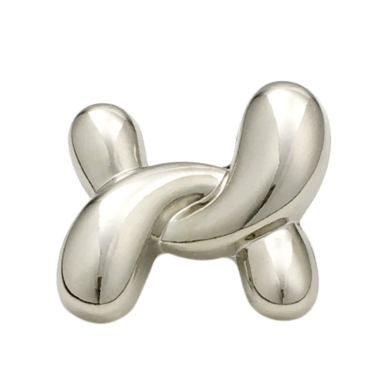 Irregular X-shaped metal button, silver tone, polished finish