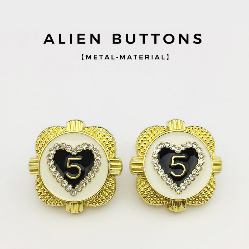 Pair of gold heart-shaped metal buttons with rhinestone heart frame and '5' fronts