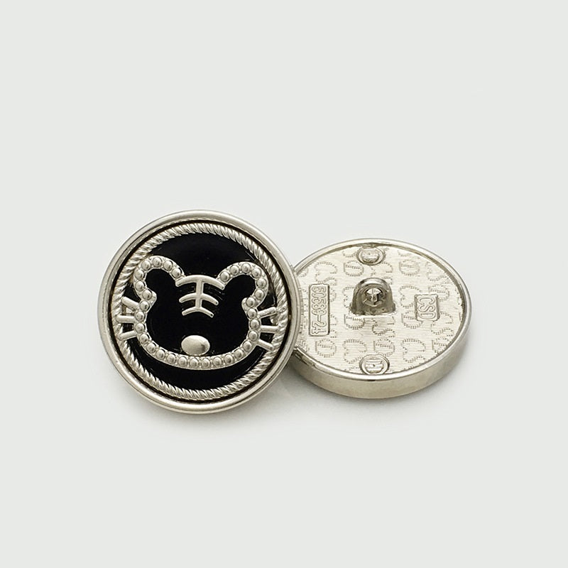 25mm round velvet tiger button, silver frame, black face panel with white whiskers