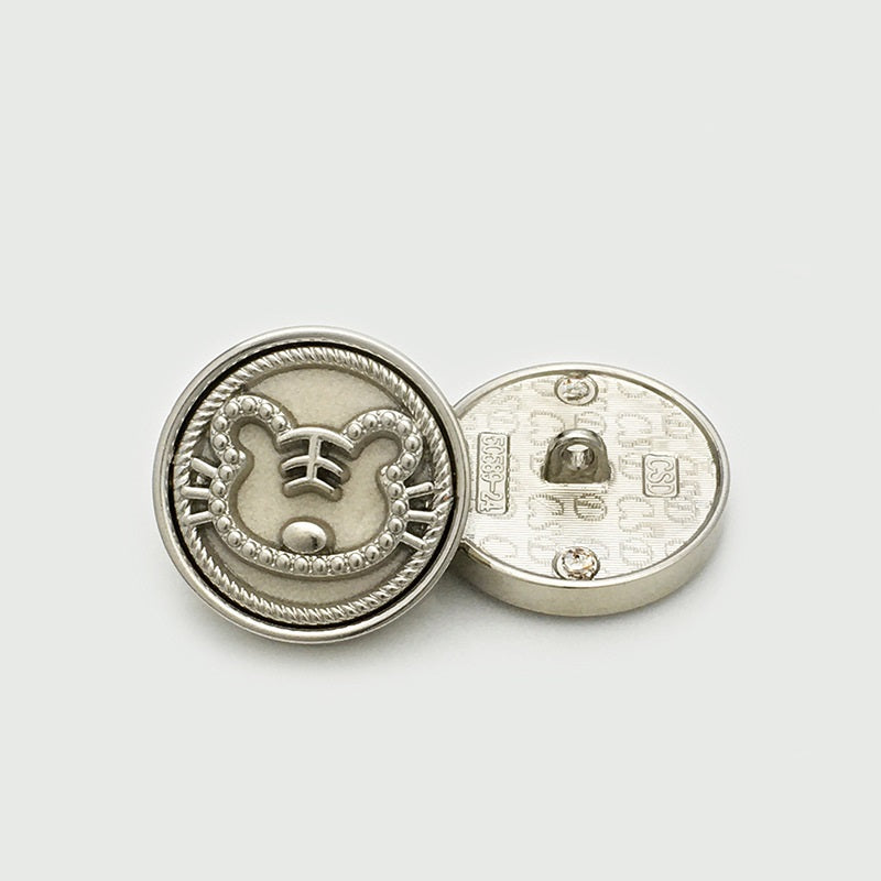 25mm round velvet tiger button, silver frame, light cream face with white whiskers