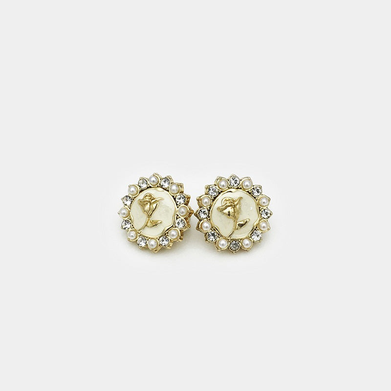 Pair of white/cream flower shirt buttons with gold bird, faux pearls and rhinestones