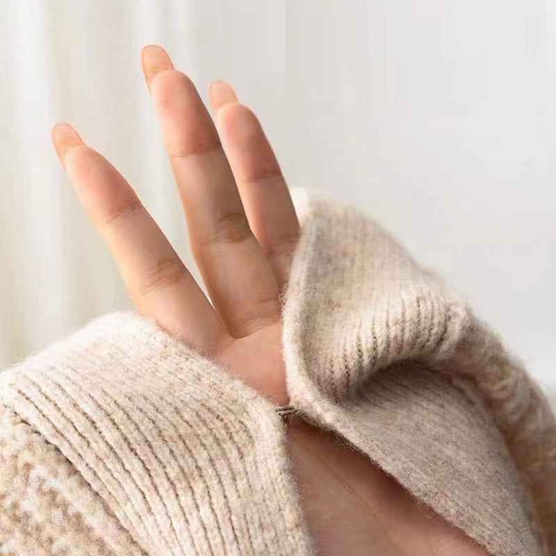 Hand securing a metal hook-and-eye fastener onto fabric for a neat closure