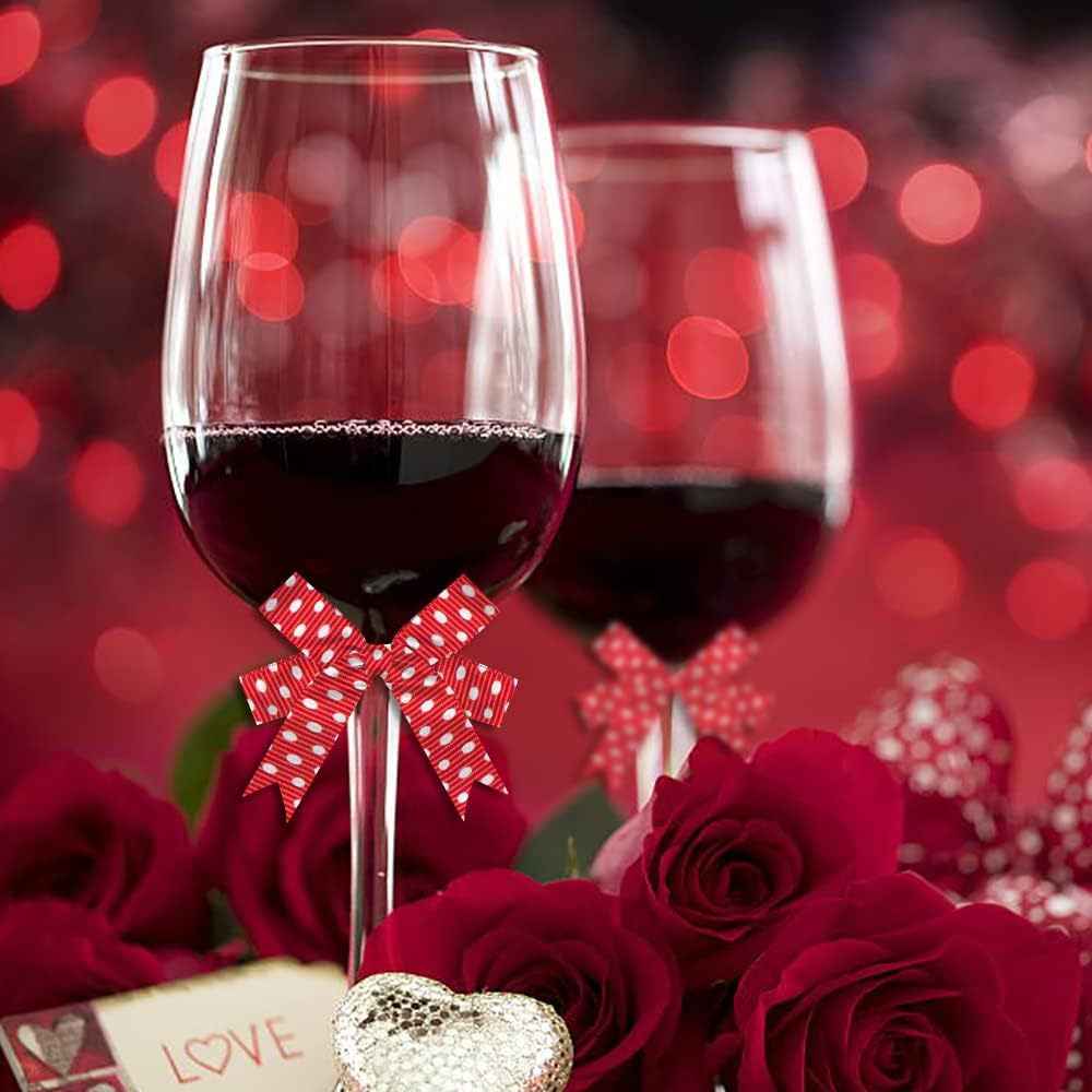 Red ribbon bow with white heart-and-dot pattern (9mm) on a Valentine's setting