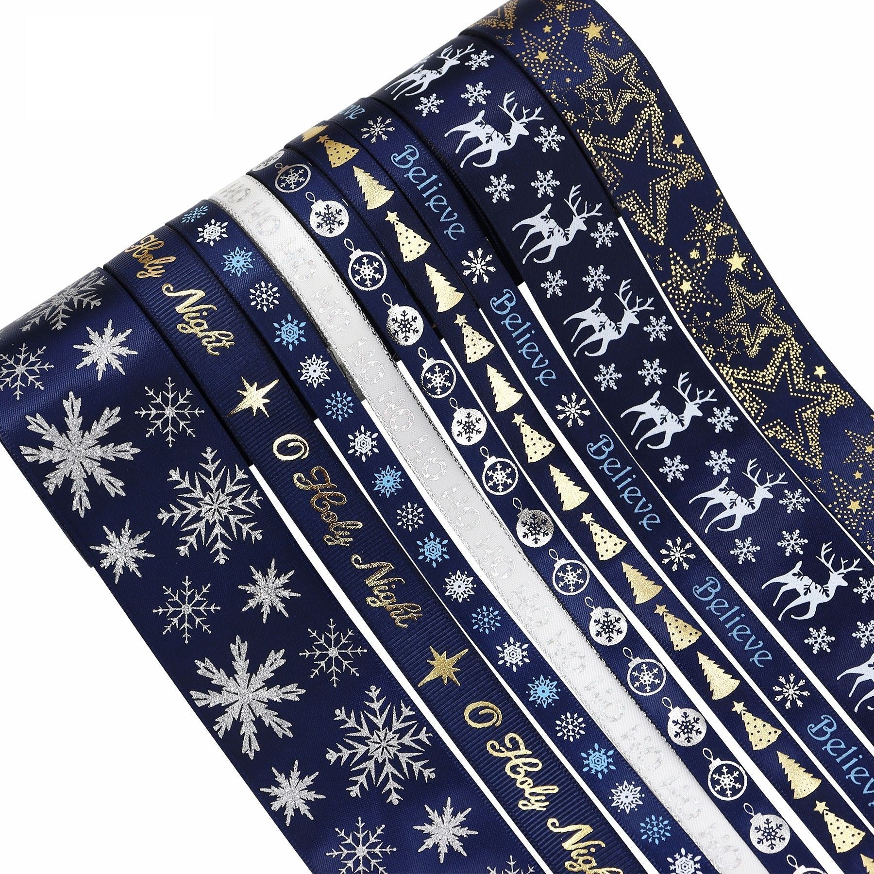 Christmas ribbon roll, navy with white snowflakes, reindeer, stars, and gold accents