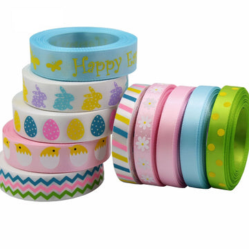 Easter ribbon 16mm pack roll, light blue with 'Happy Easter' and bunny icons