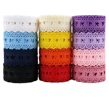 Heart-cutout grosgrain craft ribbon rolls in assorted colors