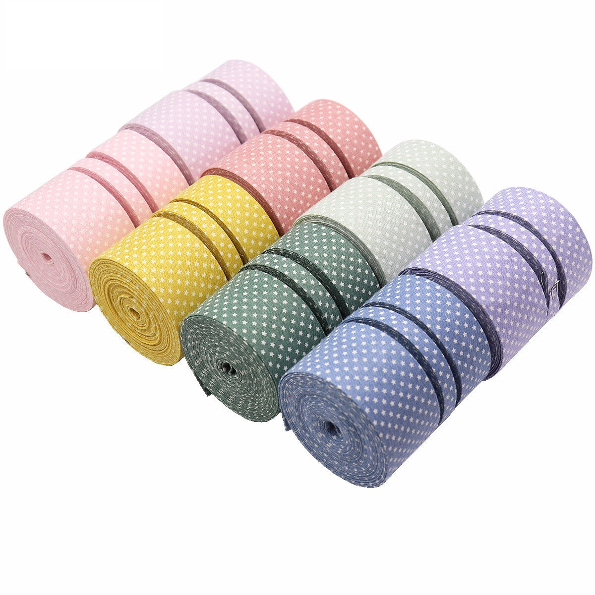 Star-printed fabric ribbon rolls in assorted colors, neatly stacked for a mixed set