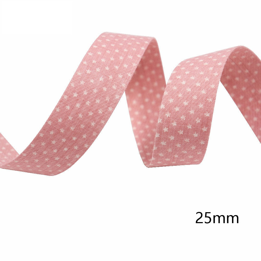 25mm wide star-printed fabric ribbon, pink with small white star pattern