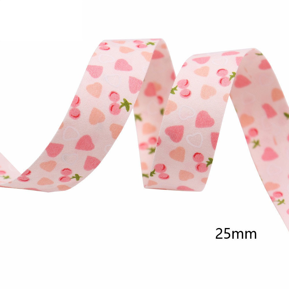 25mm pink cherry and heart bias tape ribbon, single length shown