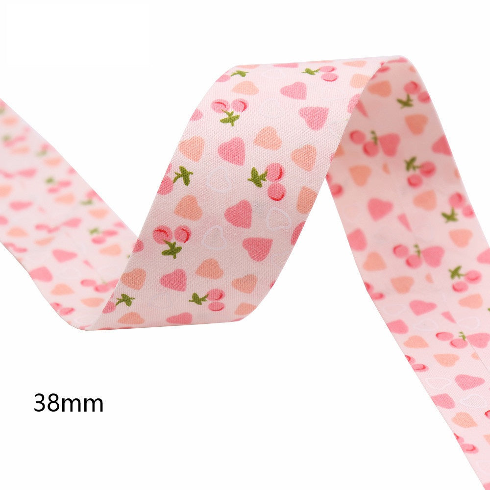38mm pink cherry and heart bias tape ribbon, single length shown