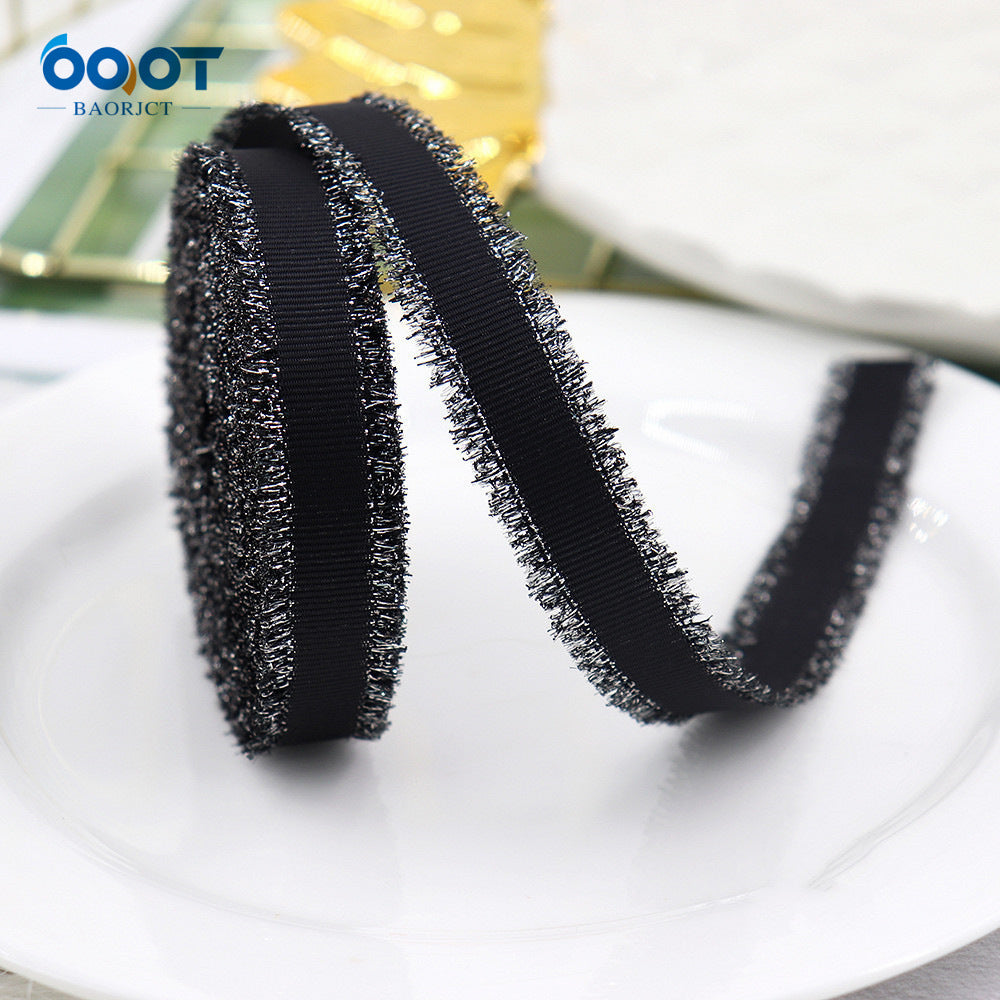 Ribbed ribbon set: dark fabric with metallic silver trim, striped texture