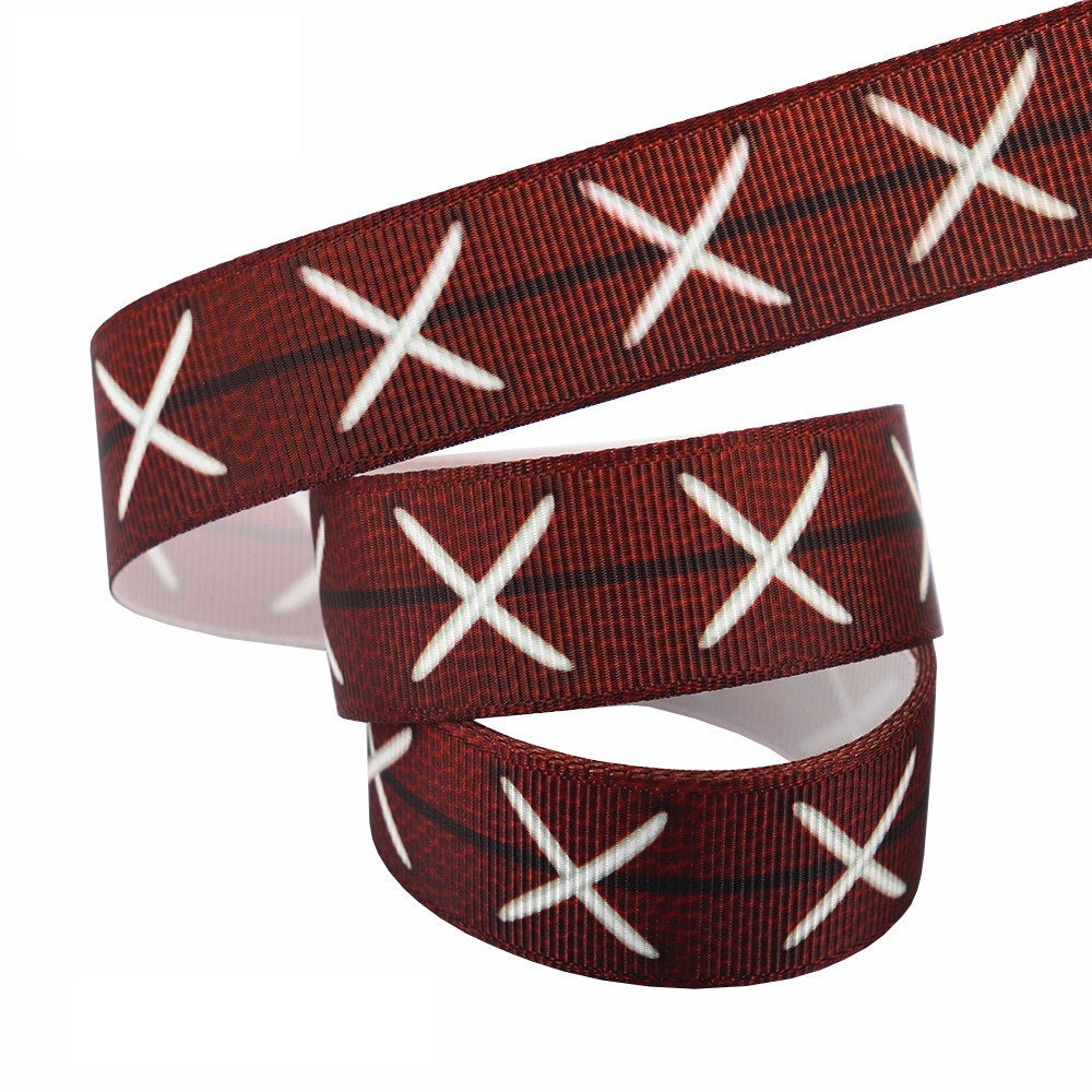 22 mm dark brown ribbon with white football lace-cross pattern, looped
