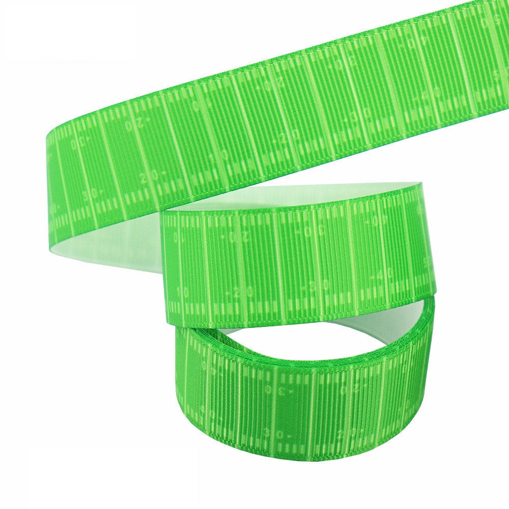22 mm bright green ribbon webbing with subtle texture and numbers, looped