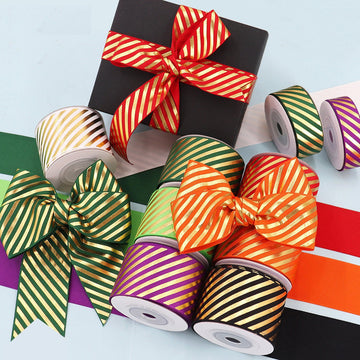 Diagonal striped grosgrain ribbon rolls, red with gold foil accents, 4-pack