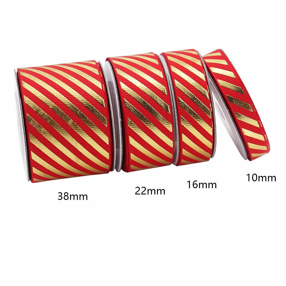 Red-and-gold diagonal stripe grosgrain ribbon with foil accent, widths 10/16/22/38mm