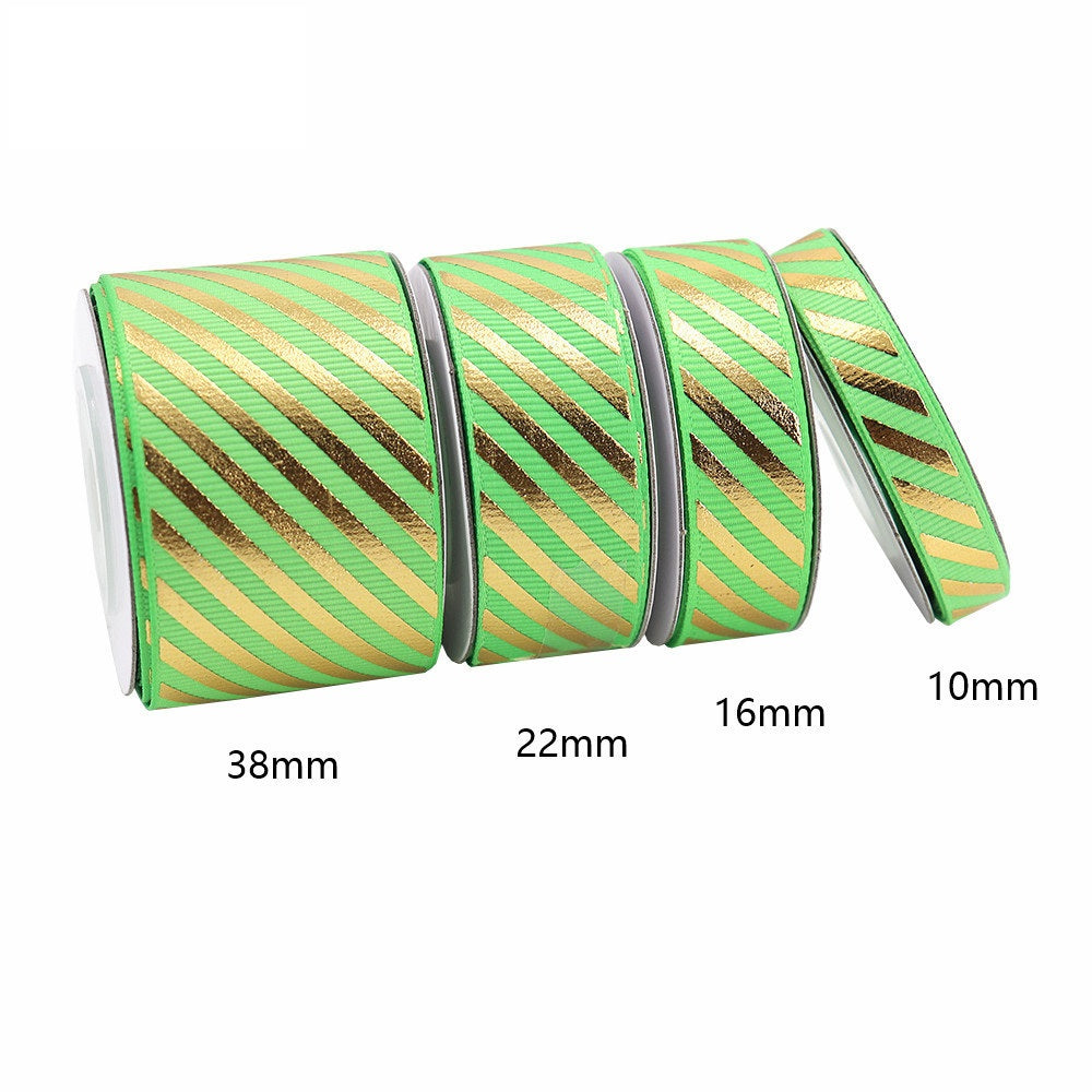 Light green-and-gold diagonal stripe grosgrain ribbon with foil accent, widths 10/16/22/38mm