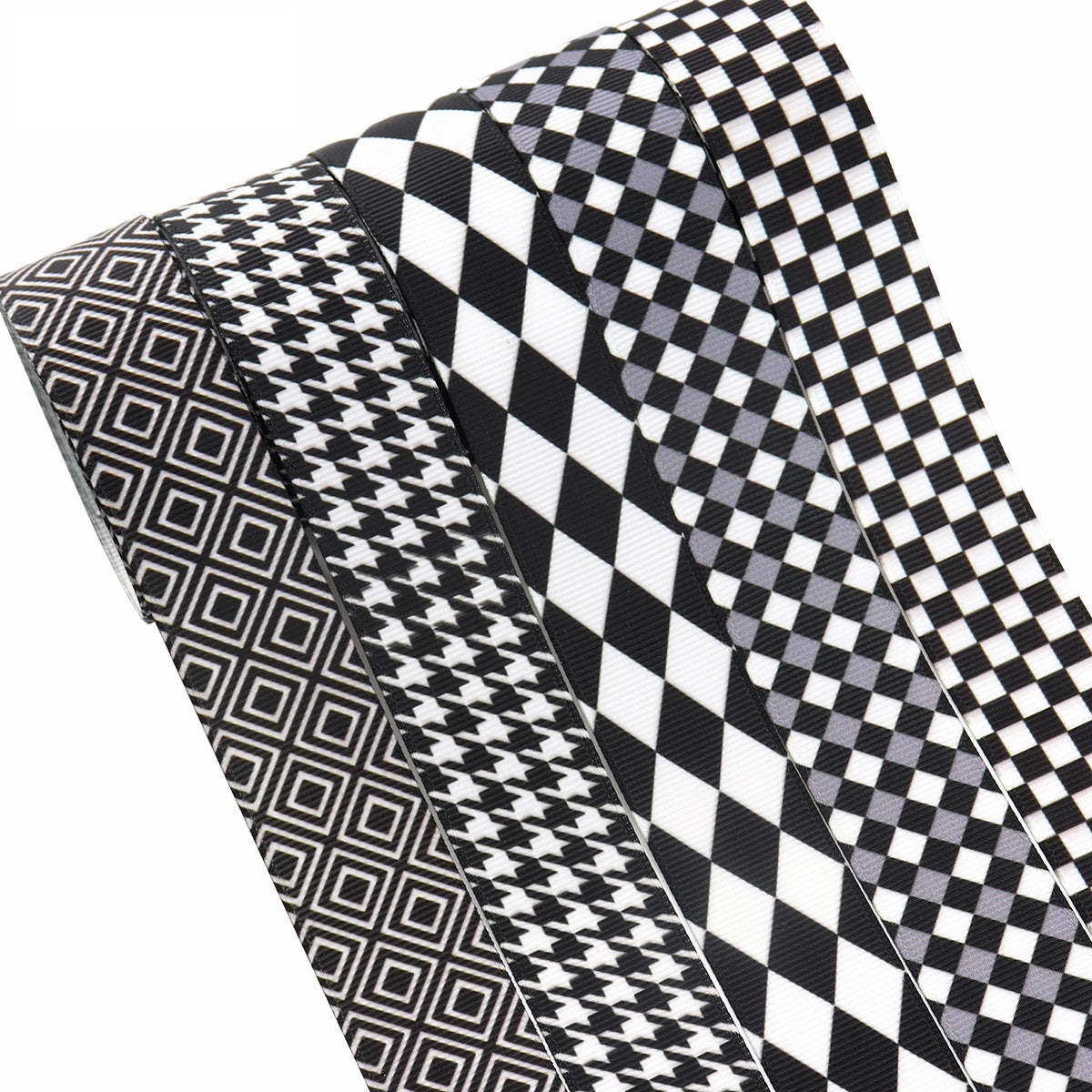 Black-and-white ribbon set, 25mm wide; multiple patterns including checks, stripes, and geometric prints.