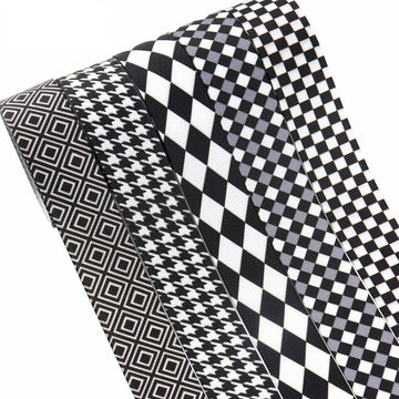 Black-and-white ribbon set, 25mm wide; multiple patterns including checks, stripes, and geometric prints.