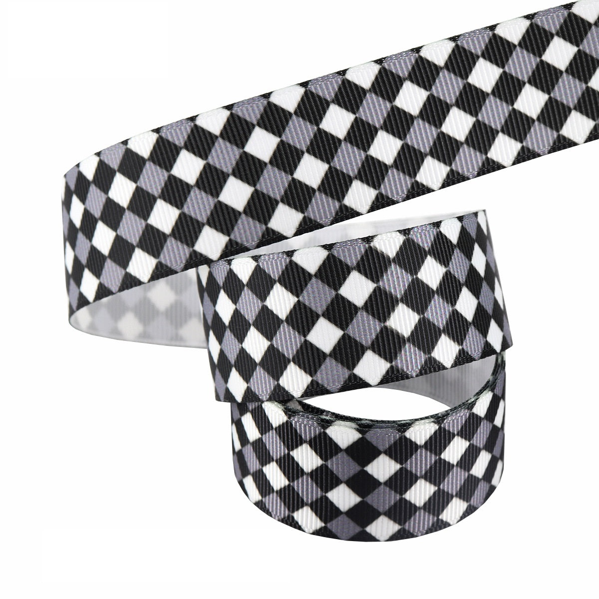 Black-and-white 25mm ribbon set; diagonal check pattern with smooth ribbed edge detail.
