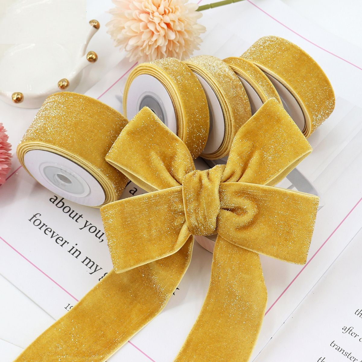 Gold yellow glitter velvet ribbon with silver edge, tied bow centerpiece