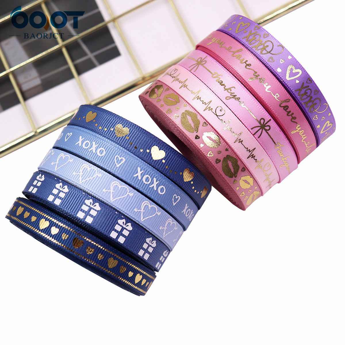Two 10mm Valentine ribbons: blue and pink rolls with hearts and XOXO