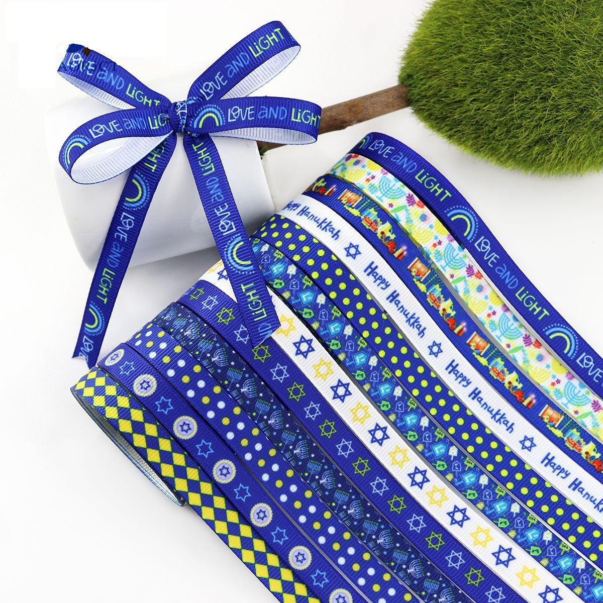 10mm Hanukkah ribbon on gift bow, blue multi-pattern band with David stars