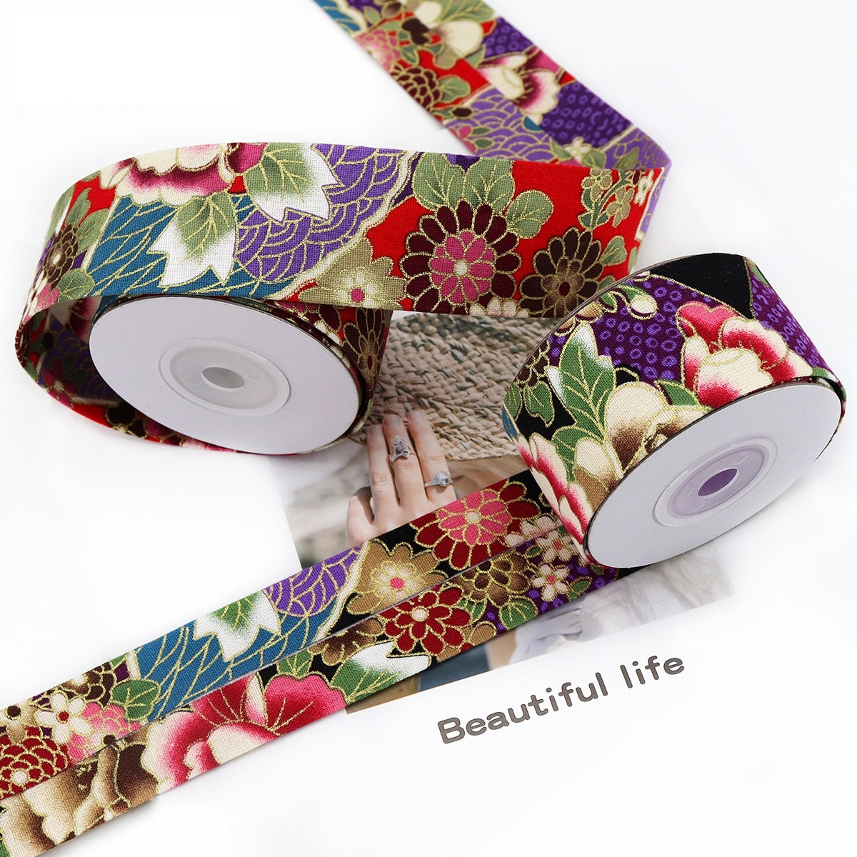 Gold-foil floral fabric ribbon on 2 spools, purple and red with green/gold details