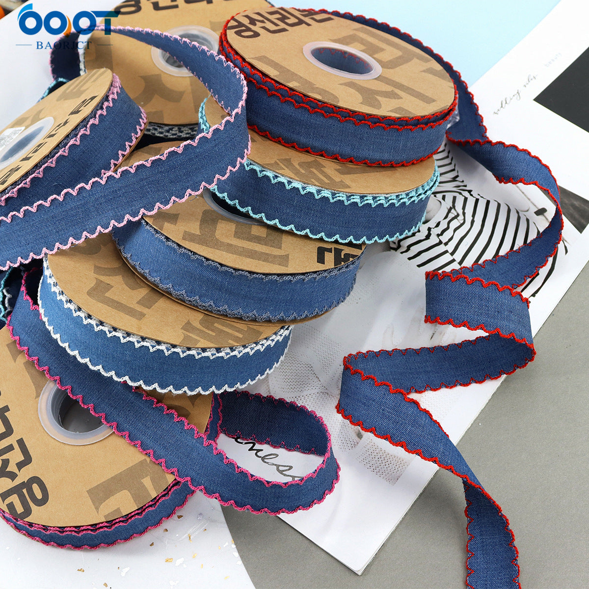 1.5-inch denim lace-edged ribbon rolls in blue tones with pink and red edges
