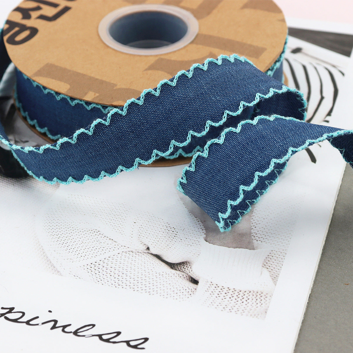 1.5-inch dark denim lace-edged ribbon with turquoise stitched zigzag trim