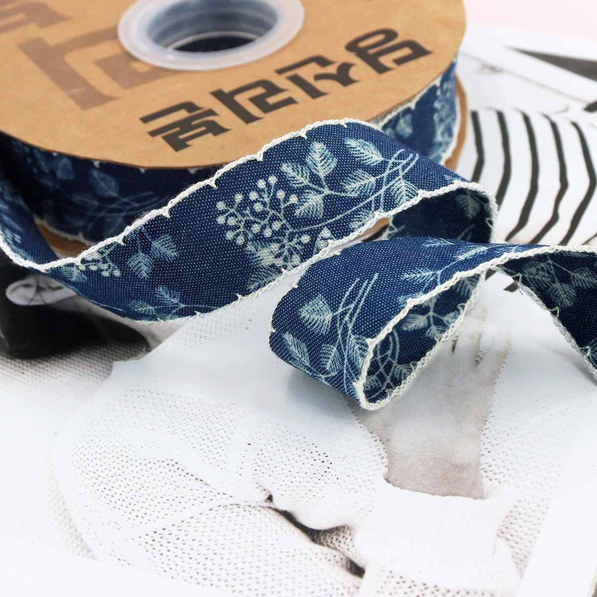 Dark blue denim ribbon with lace trim and floral motifs, 1.5 inch wide