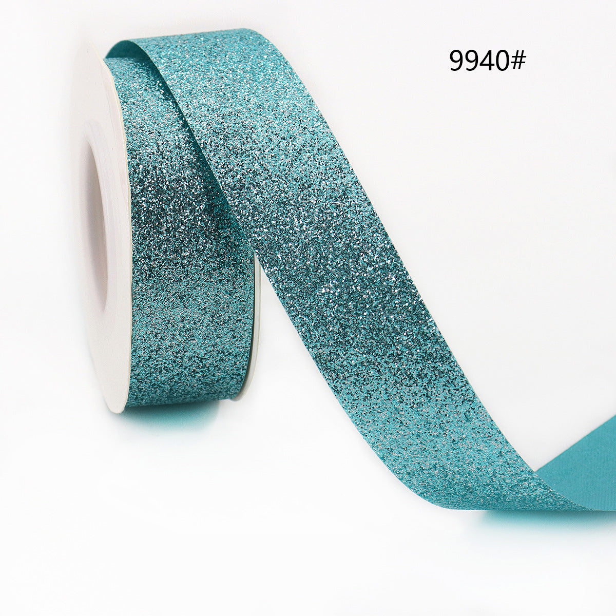Turquoise glitter ribbon on spool, super shiny for presents and craft projects