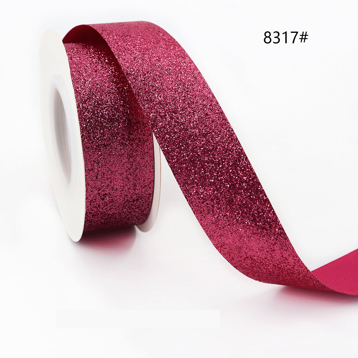 Burgundy red glitter ribbon on spool, high-shine for gift wrapping and crafts